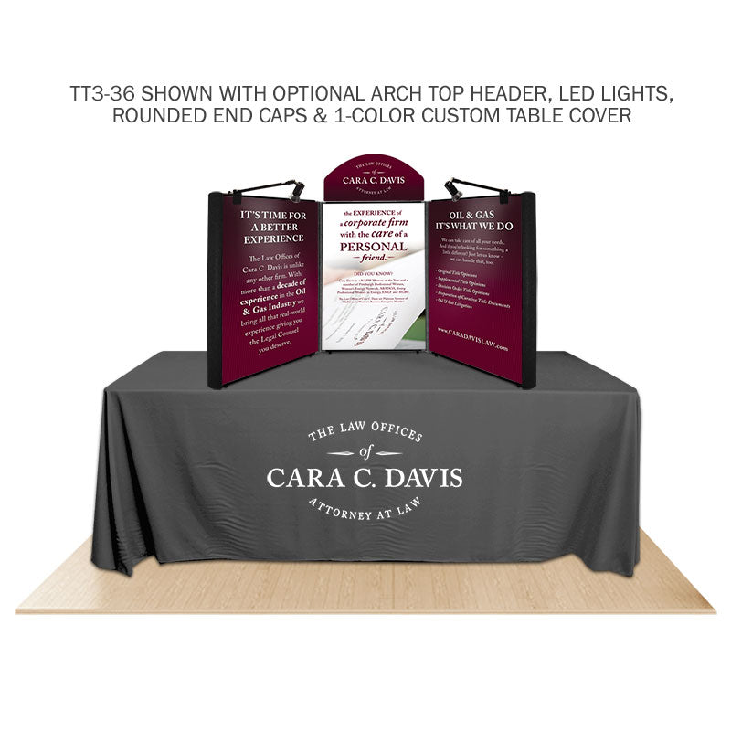 Promoter backlit table top display with images  and arch top and LED lights on white background.