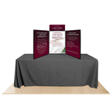 Promoter backlit table top display with images on white background.